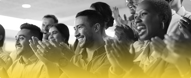 Applauding attendees celebrating achievements