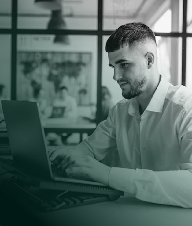 Professional creating an account on a laptop